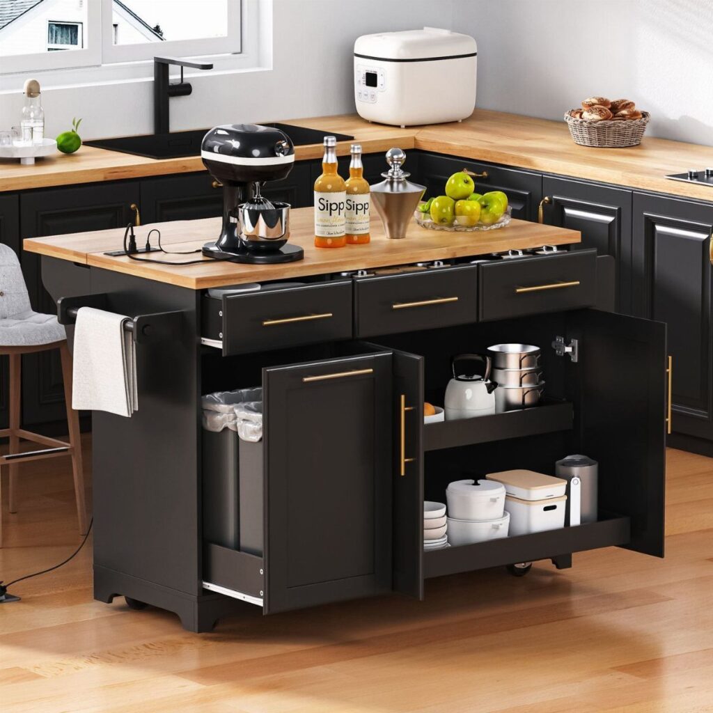 A black kitchen island with open storage compartments and drawers on a wooden floor.